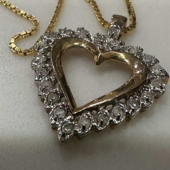 This is a yellow gold open heart diamond pendant necklace on a gold chain - Picture 4 of 8